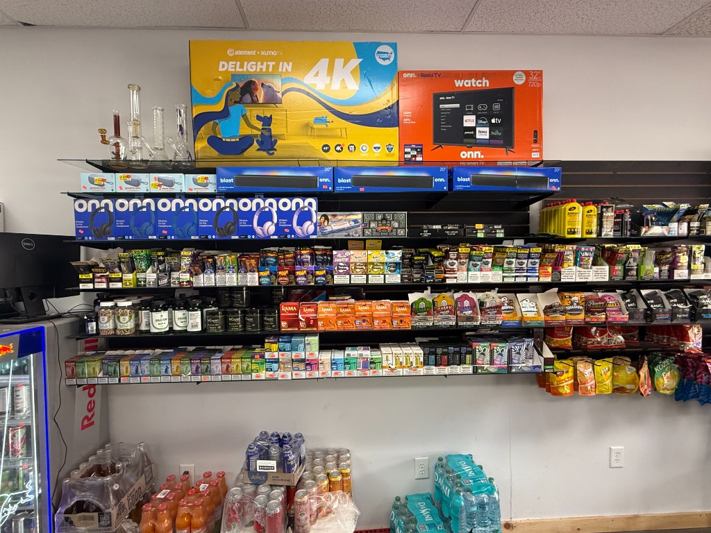 Shop selection wall at Dillard Vape and Lotto