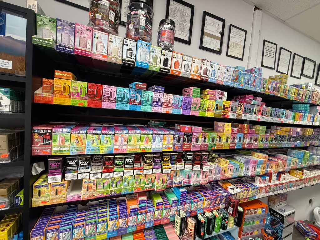 Cold drinks and convenience section at Dillard Vape and Lotto