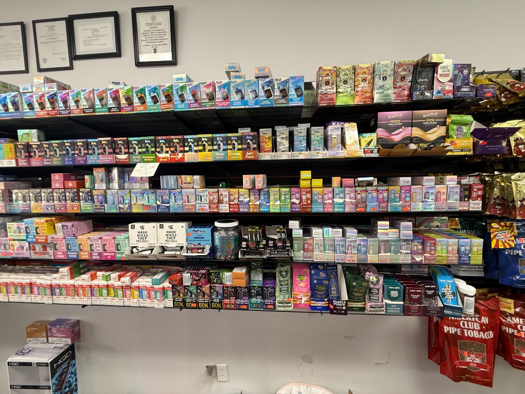 Vape and product shelves inside Dillard Vape and Lotto
